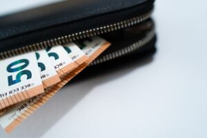 Black,Wallet,With,50,Euro,Banknotes,On,White,Background.finance,And